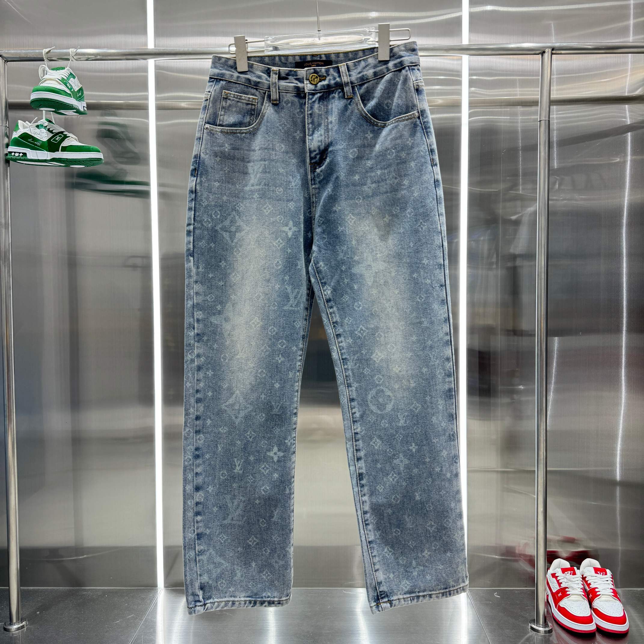 Louis Vuitton blue denim pants with monogram pattern, belt loops, button fly