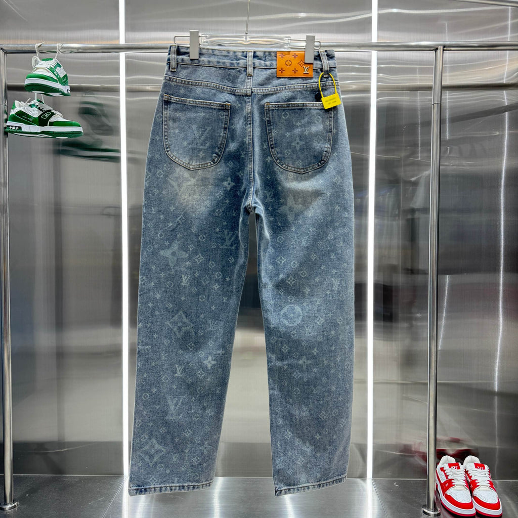 Louis Vuitton blue denim pants with monogram pattern, back patch pockets, button fly