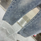 Louis Vuitton denim hem close-up, light blue monogram print stitching