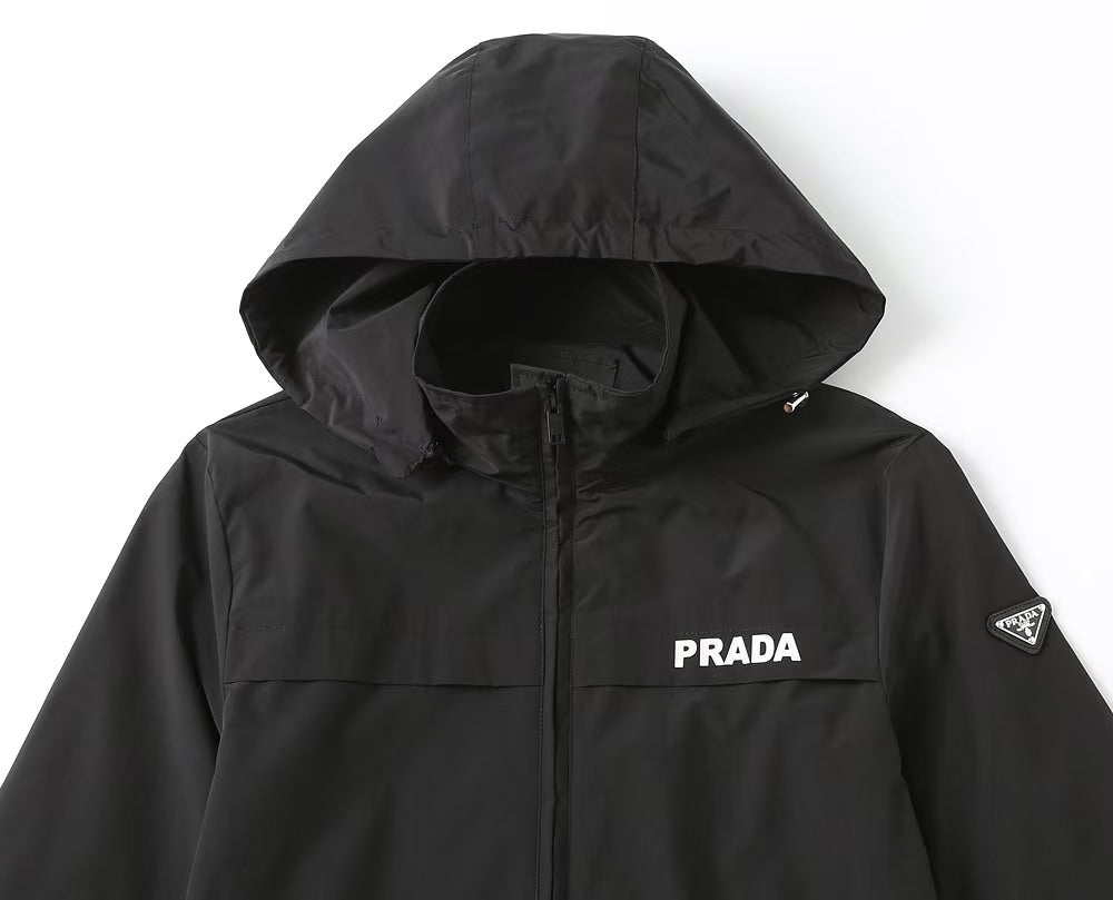Black PRADA hooded long jacket with center zip and PRADA chest logo