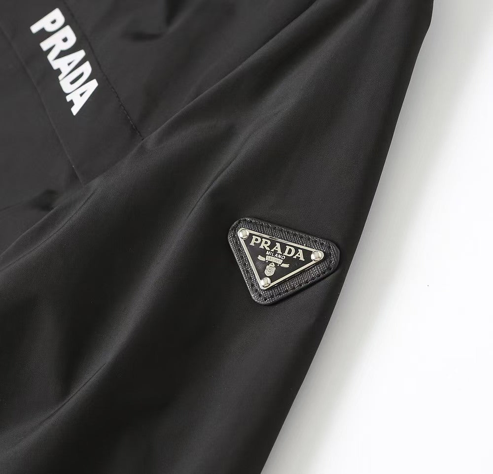 Black PRADA long jacket with triangular logo badge