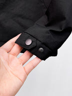 Dior long jacket, black cuff with snap button and textured sleeve end