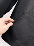 Dior long jacket, black textured fabric sleeve with visible seam stitching