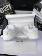 Amiri sneakers, white leather heels with light-blue rubber soles