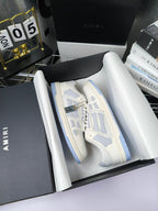 Amiri lace-up sneakers in box, white leather with blue stripe trim