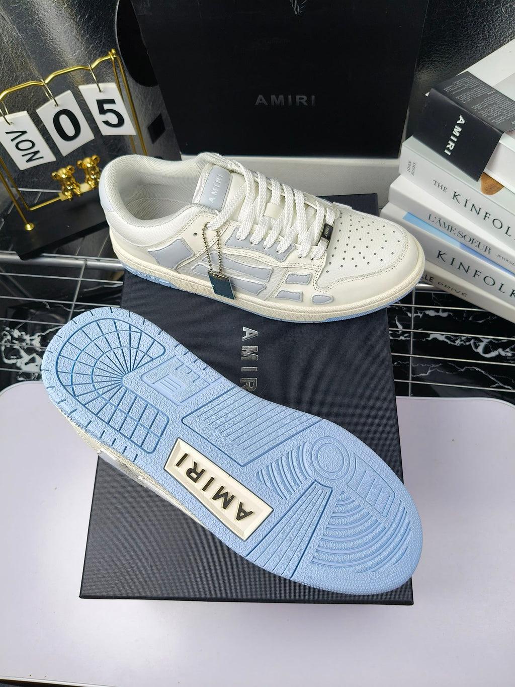 Amiri sneakers outsole, light-blue textured rubber tread on white shoe