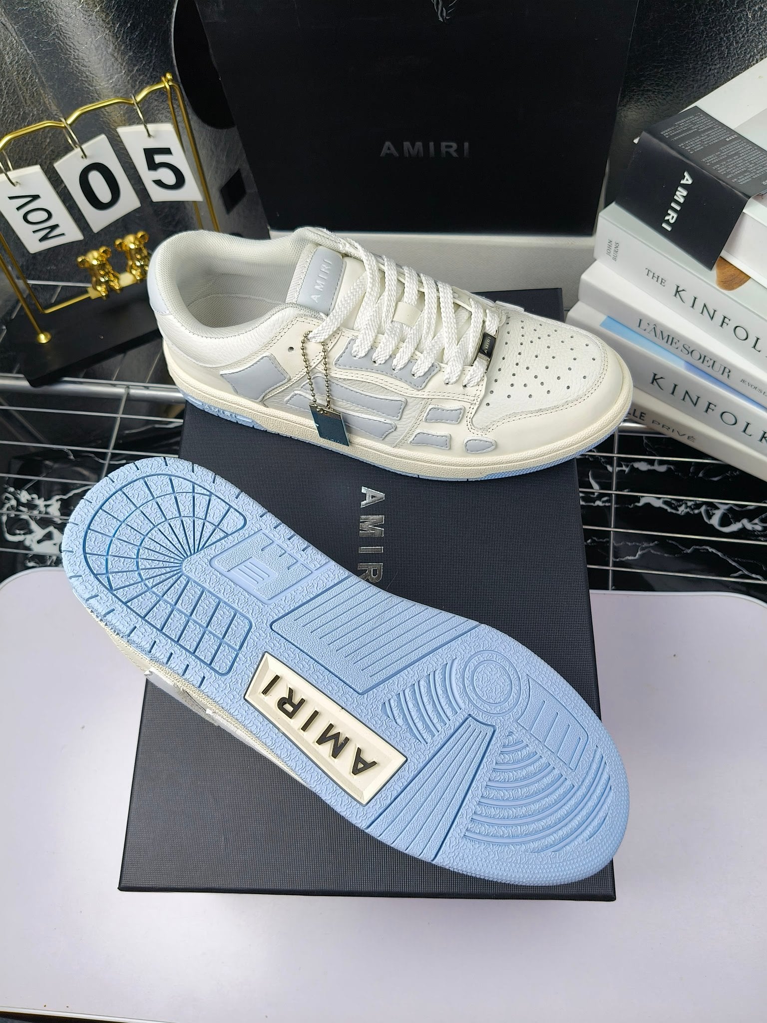 Amiri sneakers outsole, light-blue textured rubber tread on white shoe