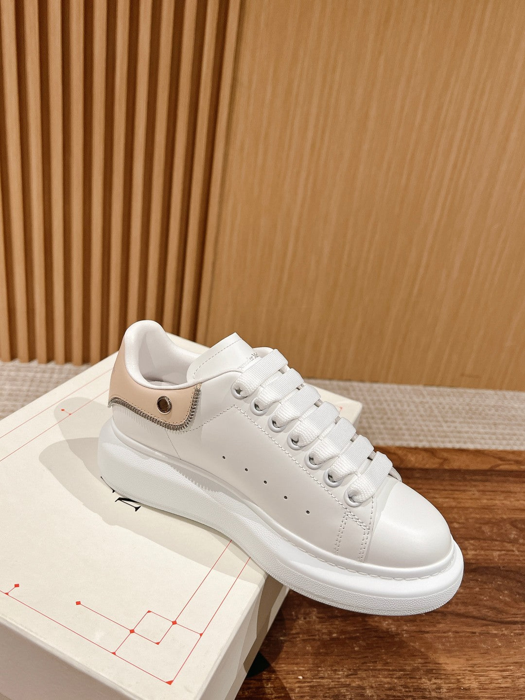 White lace-up leather sneakers with beige side panel and low rubber sole, Alexander McQueen