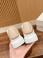 White slip-on sneakers with beige interior lining and stitched detail, Alexander McQueen