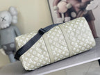 Louis Vuitton duffel bag, light beige monogram canvas, dark strap detail and zipper hardware