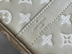 Louis Vuitton monogram bag exterior label stitching on beige leather with pattern