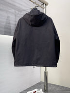 Dior long jacket, black hood with full back coverage and zip-front silhouette