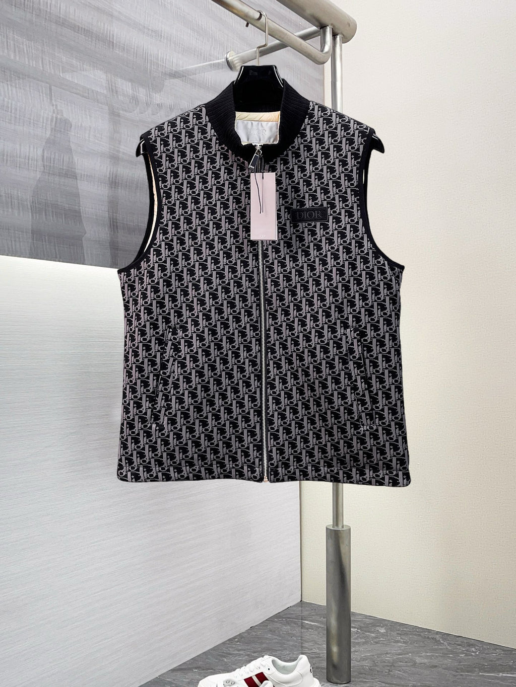 Black sleeveless vest with allover Dior monogram pattern and front zip