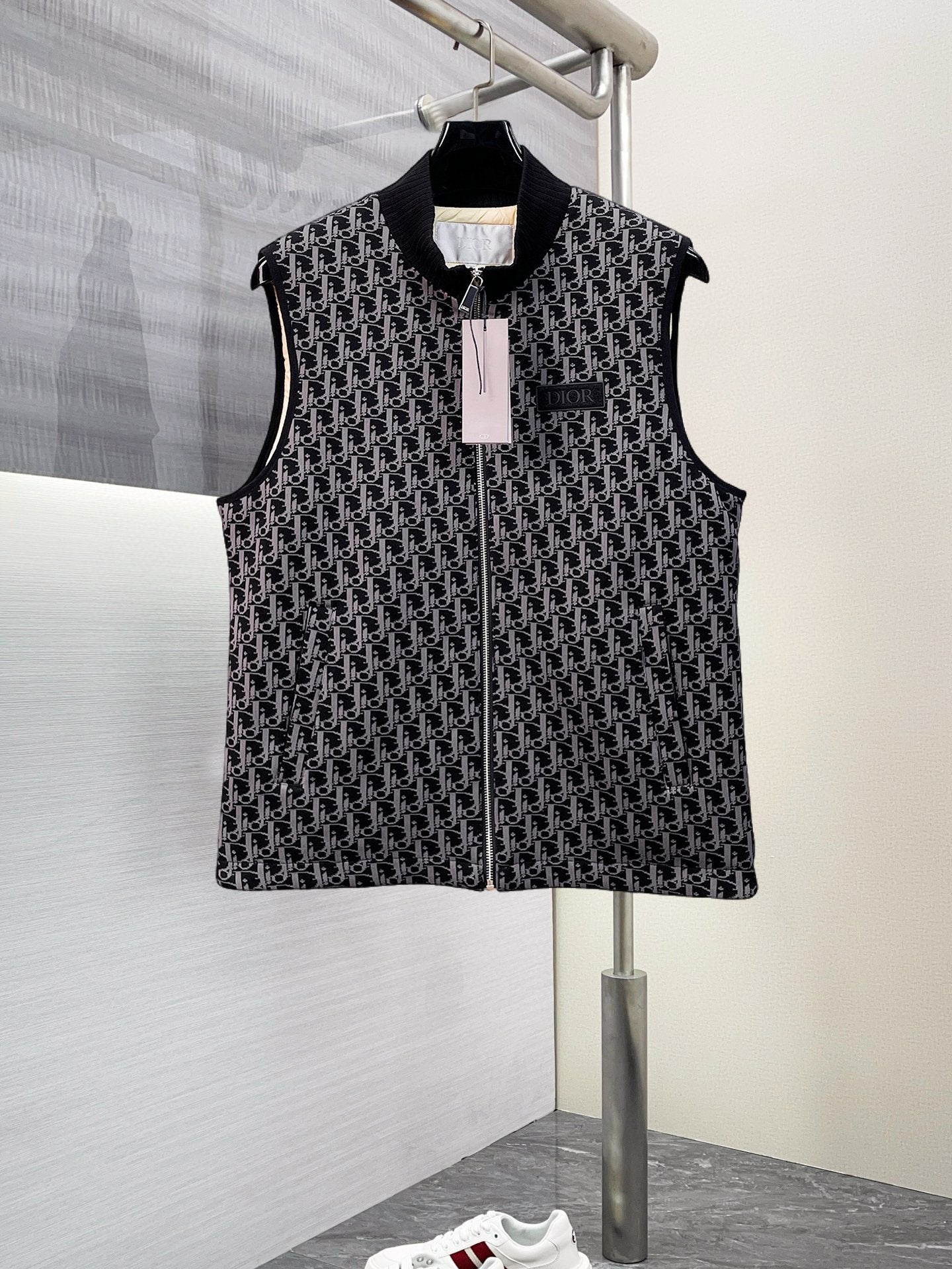 Black sleeveless vest with allover Dior monogram pattern and front zip