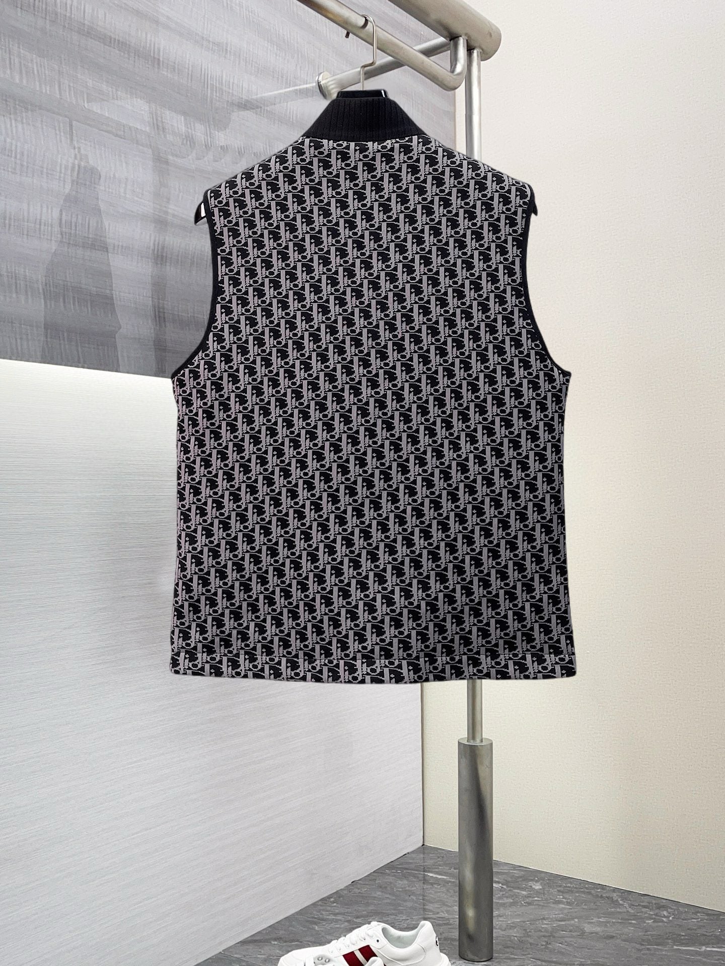 Black sleeveless vest with Dior monogram pattern, rear view
