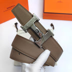 Olive leather belt with silver-tone geometric buckle and prong hole