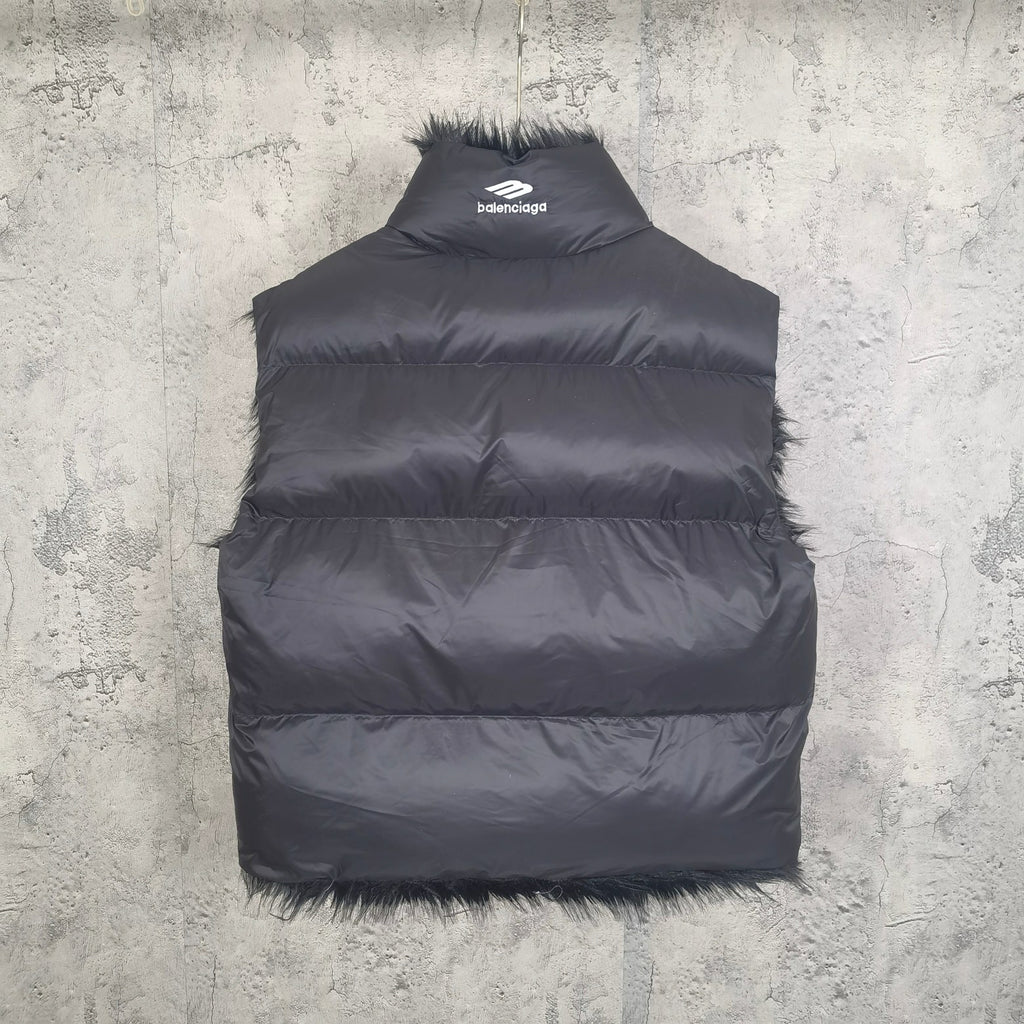 Navy sleeveless puffer vest with faux-fur trim and small back logo patch