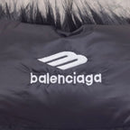 Navy puffer vest chest logo detail with balenciaga wordmark and emblem