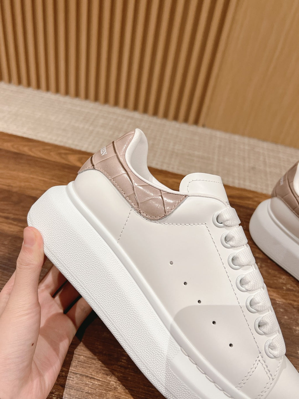 White and rose-gold leather sneakers with lace-up front and quilted heel panel