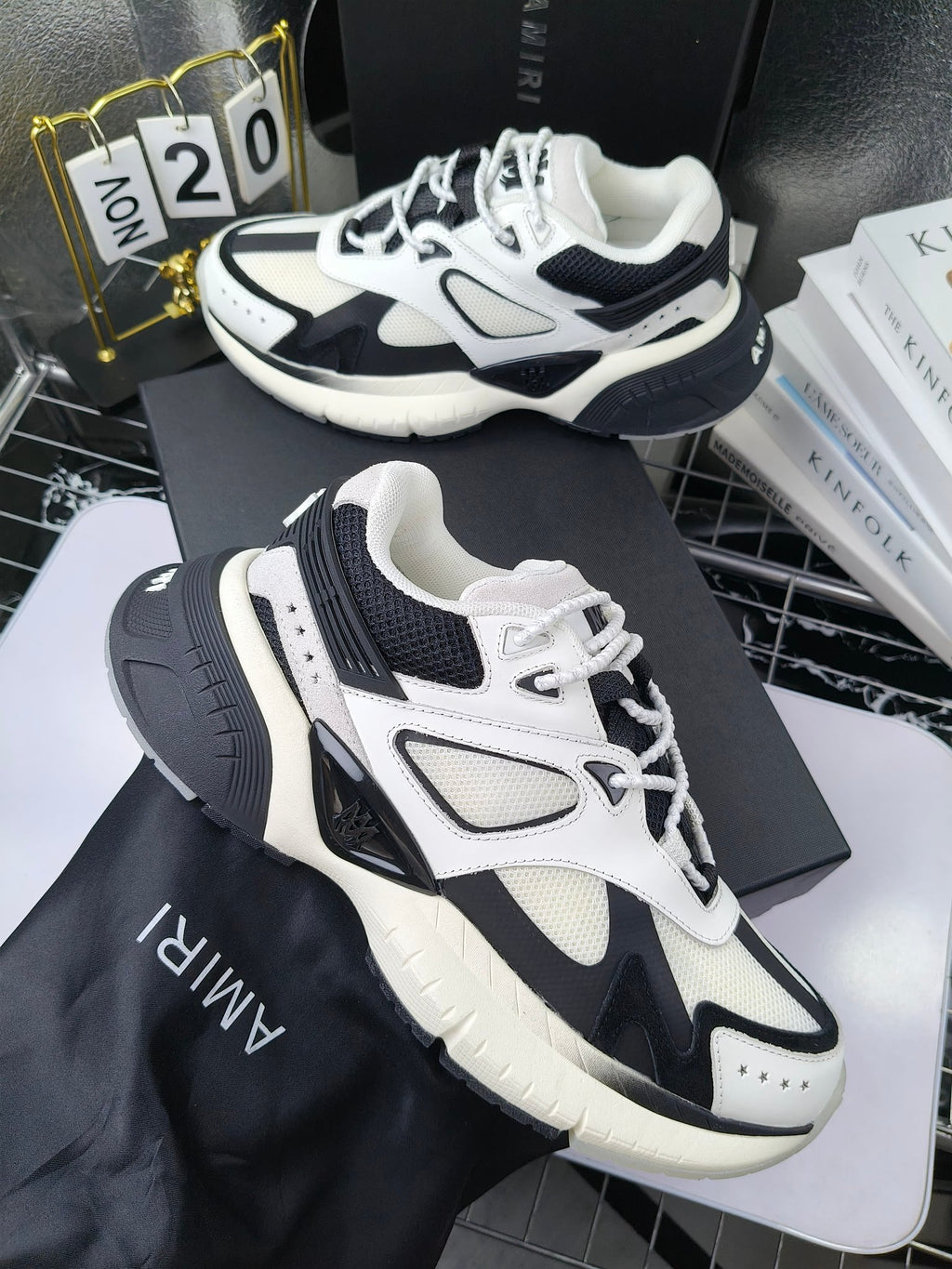 Amiri sneakers in white and navy with lace-up front and chunky sole