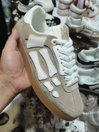 Amiri low-top sneakers, beige suede with white panels and white laces