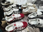 Amiri sneakers set in white, black, and red, multiple pairs shown