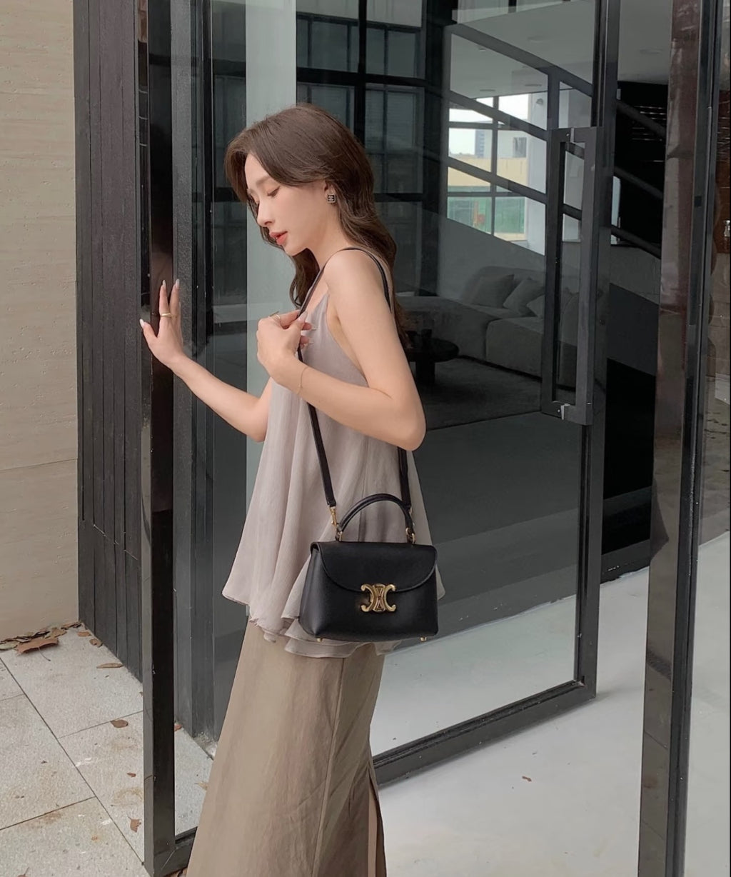 Celine black mini bag with top handles and gold logo front flap