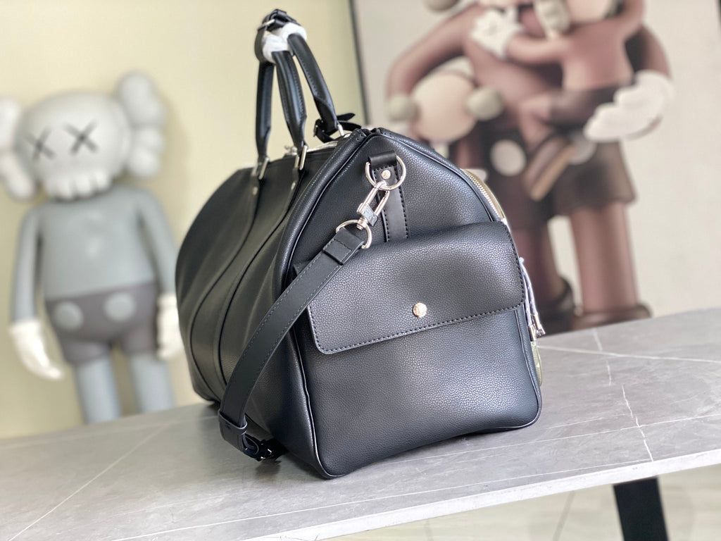 Louis Vuitton men’s leather duffle bag, rounded top handles and adjustable shoulder strap