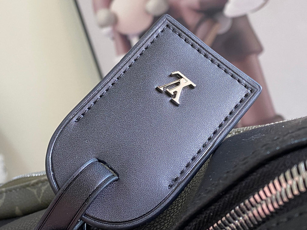 Louis Vuitton bag front plaque, dark blue leather with metal latch