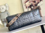 Men’s Louis Vuitton monogram duffel bag with embossed pattern, top handle, and luggage-style strap