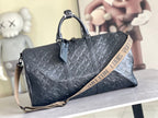 Men’s Louis Vuitton monogram duffel bag in dark navy with top handles and side strap