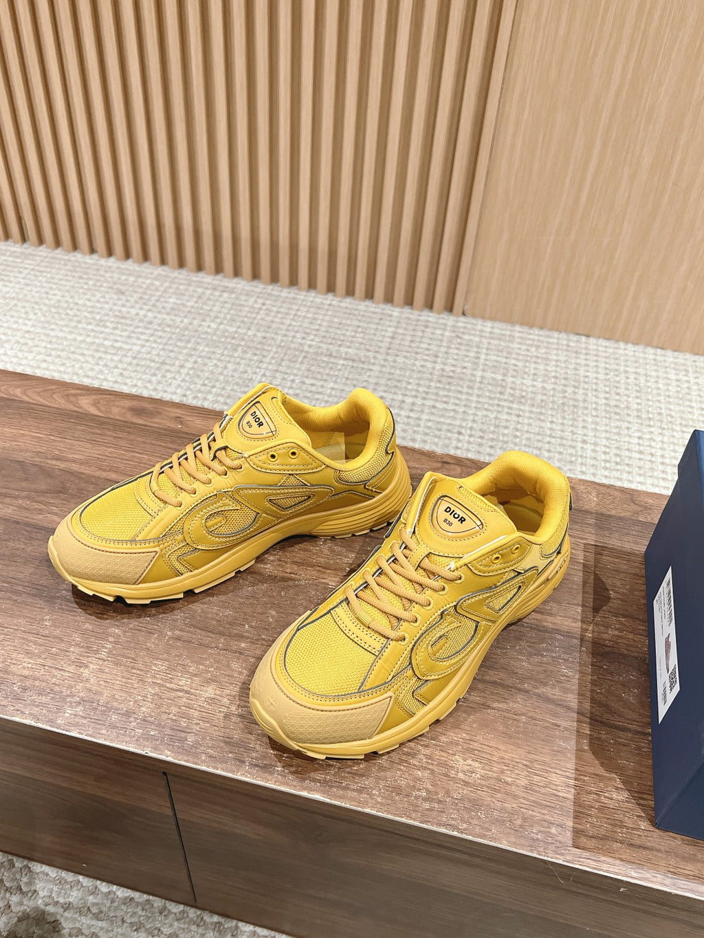 Yellow Dior unisex lace-up sneakers with side logo and rounded toe