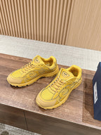 Yellow Dior unisex lace-up sneakers with side logo and rounded toe