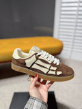 Amiri suede sneakers, brown and cream with white laces and logo detailing