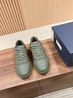 Dior unisex sneakers, olive green lace-up with textured panels and logo details