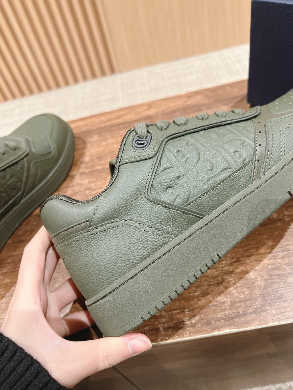 Dior unisex sneaker, olive green leather-texture with stitched collar and lace-up