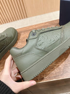 Dior unisex sneaker, olive green leather-texture with stitched collar and lace-up