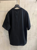 Black short-sleeve T-shirt on hanger, back view