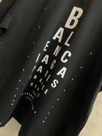 Balenciaga black graphic T-shirt with large stacked letter print on the front