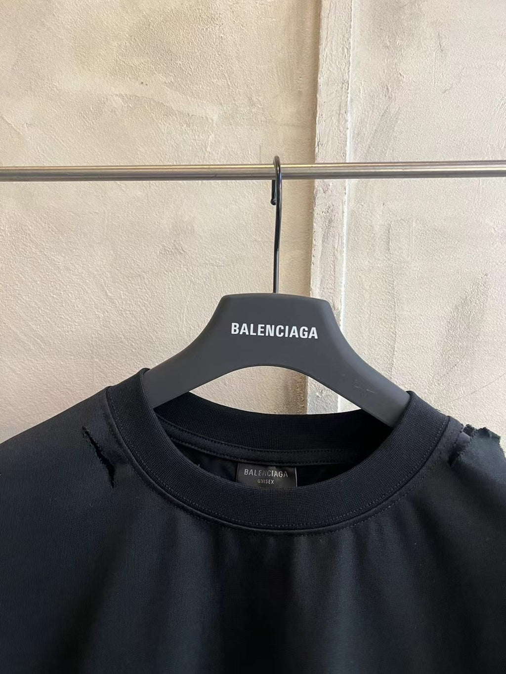 Balenciaga black crew-neck T-shirt with small neck label and ribbed collar