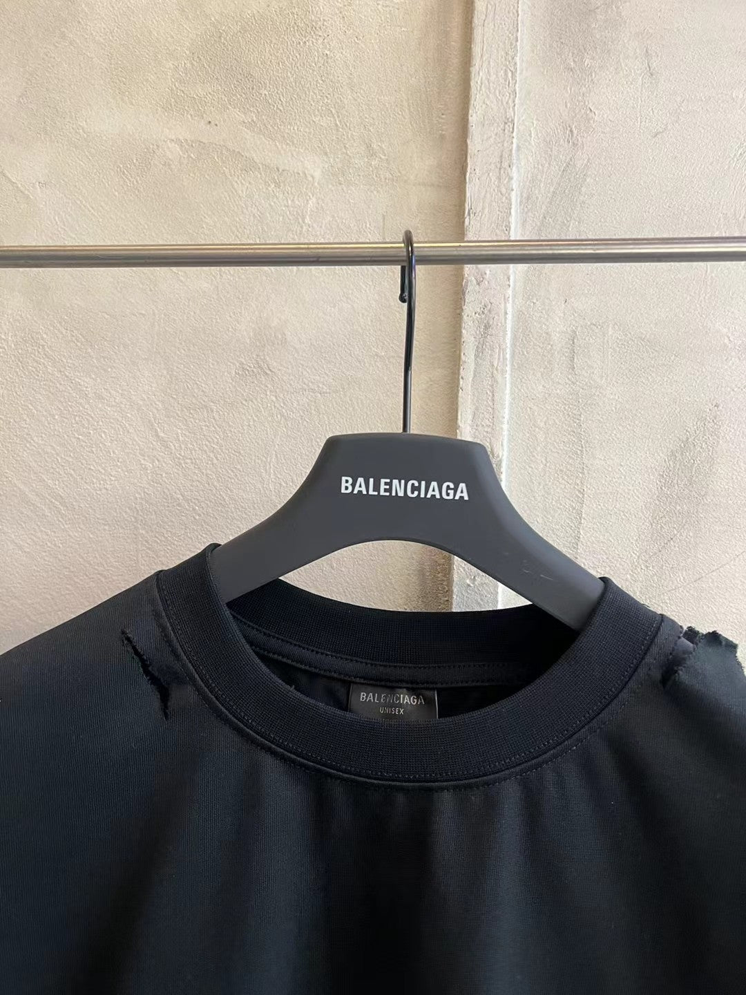 Balenciaga black crew-neck T-shirt with small neck label and ribbed collar