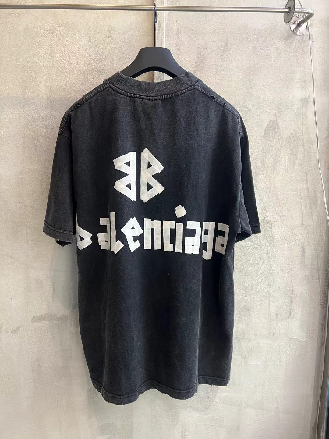 Black T-shirt with Balenciaga and AB logo graphic on back, crew neck