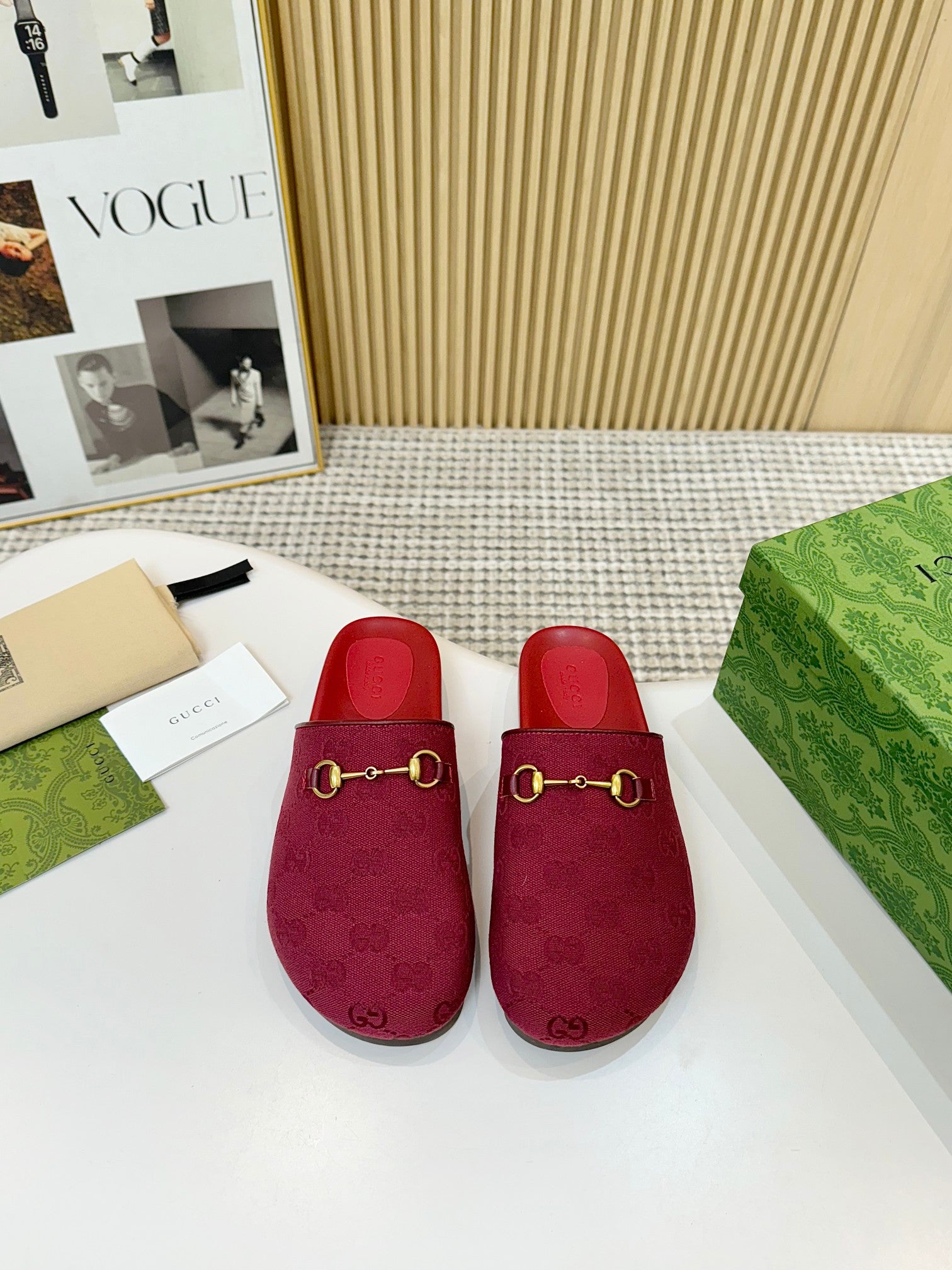 Gucci mule sandals in dark red, GG patterned fabric uppers with gold-tone buckle details