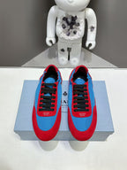 Prada unisex sneakers, red and blue colorblock, black laces, on display box