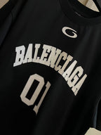 Balenciaga '01' and BALENCIAGA lettering graphic on dark navy T-shirt