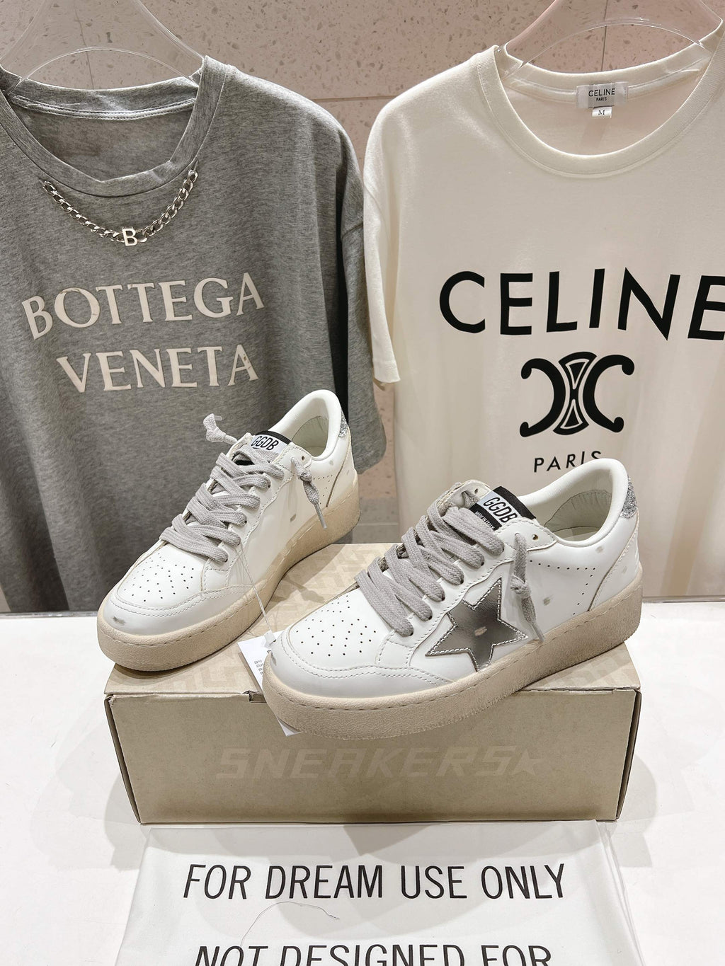 Golden Goose white sneakers with gray laces, star logo on the side