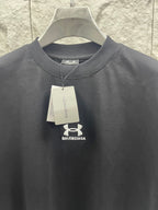 Gray crewneck T-shirt with hanging tag and small chest logo