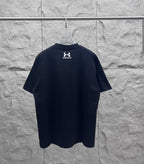 Dark navy short-sleeve T-shirt, rear view with small chest logo print