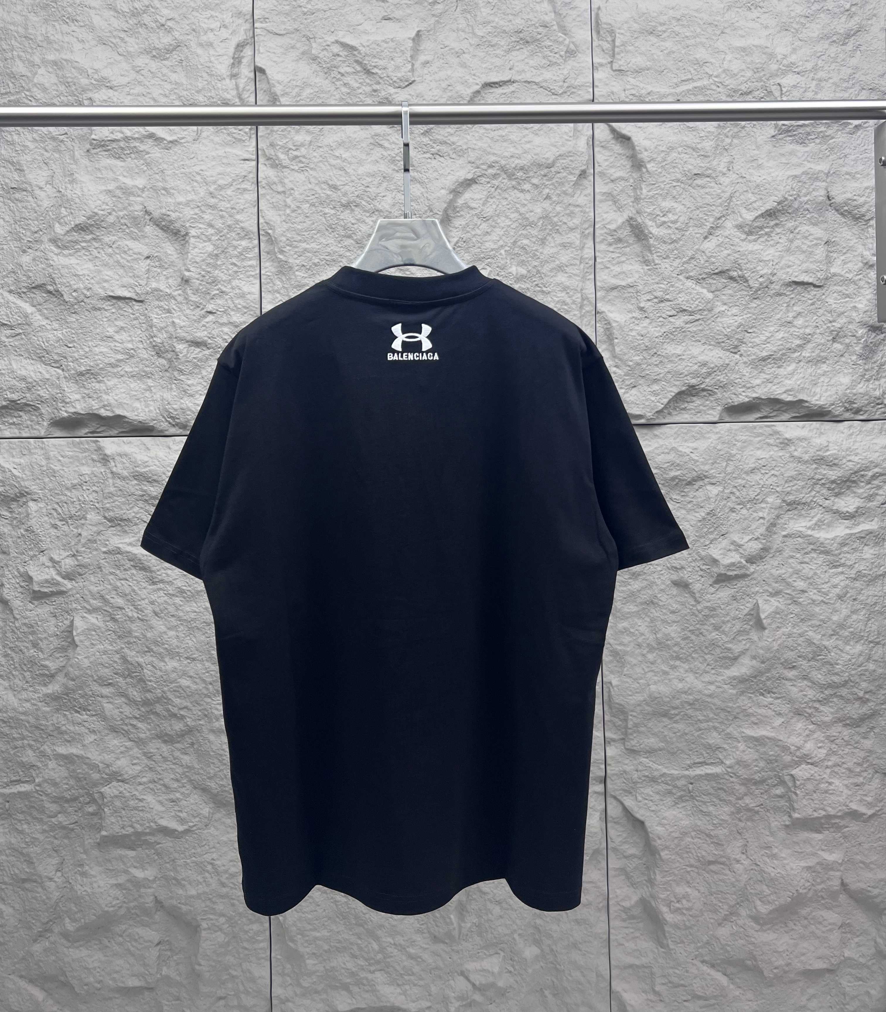 Dark navy short-sleeve T-shirt, rear view with small chest logo print