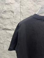 Dark crewneck T-shirt back and sleeve view